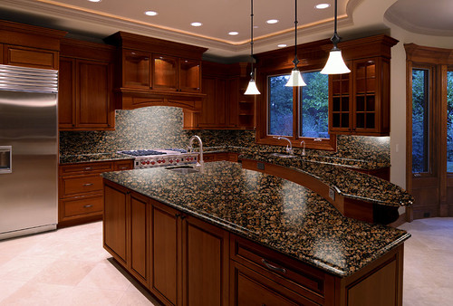 Baltic Brown Island Top with Breakfast Nook, Baltic Brown Countertop, Baltic Brown Full High Backsplash, Dark Cherry Cabinets and Light Color Ceramic Flooring